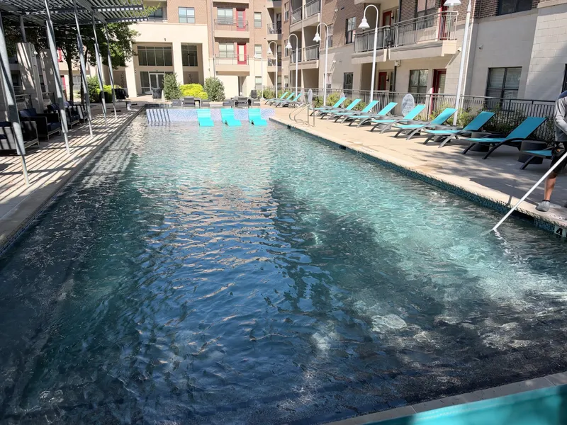 Apartment complex pool we service, clear water and loungers out