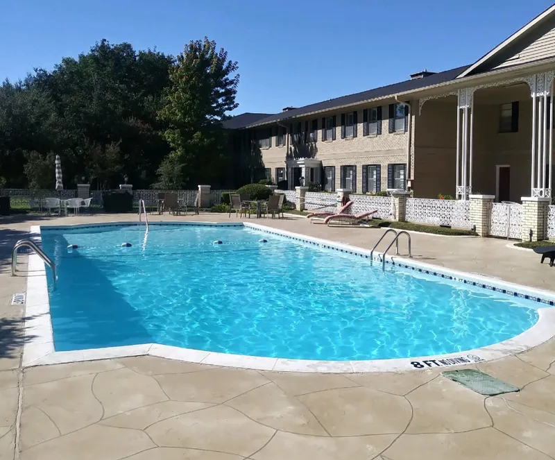 Condo complex pool with clear blue water